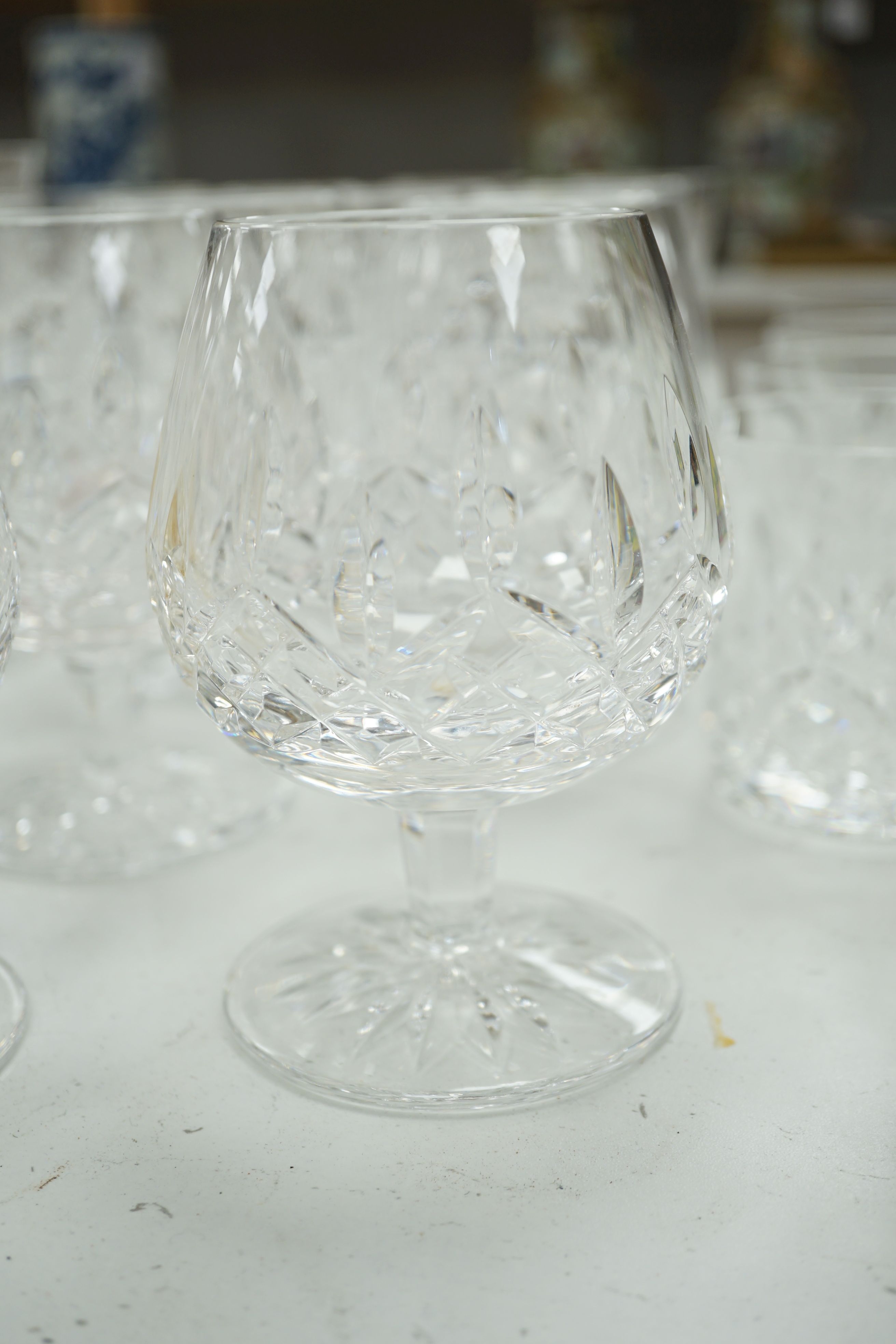 A 68 piece part suite of Waterford cut crystal ‘’Lismore’’ pattern drinking glassware, consisting:- 12 champagne glasses, 9 red wine glasses, 6 white wine glasses, 12 liqueur glasses, 12 whisky tumblers, 12 sherry glasse